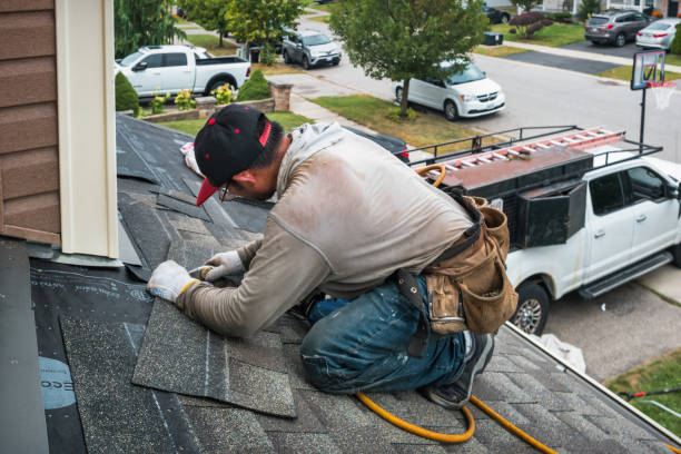 Professional Flat Roof Repair technician working in Amesbury, MA